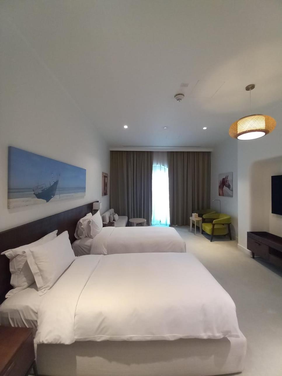 Mina Hotel And Residences By The Torch Doha Exterior foto A room at the hotel