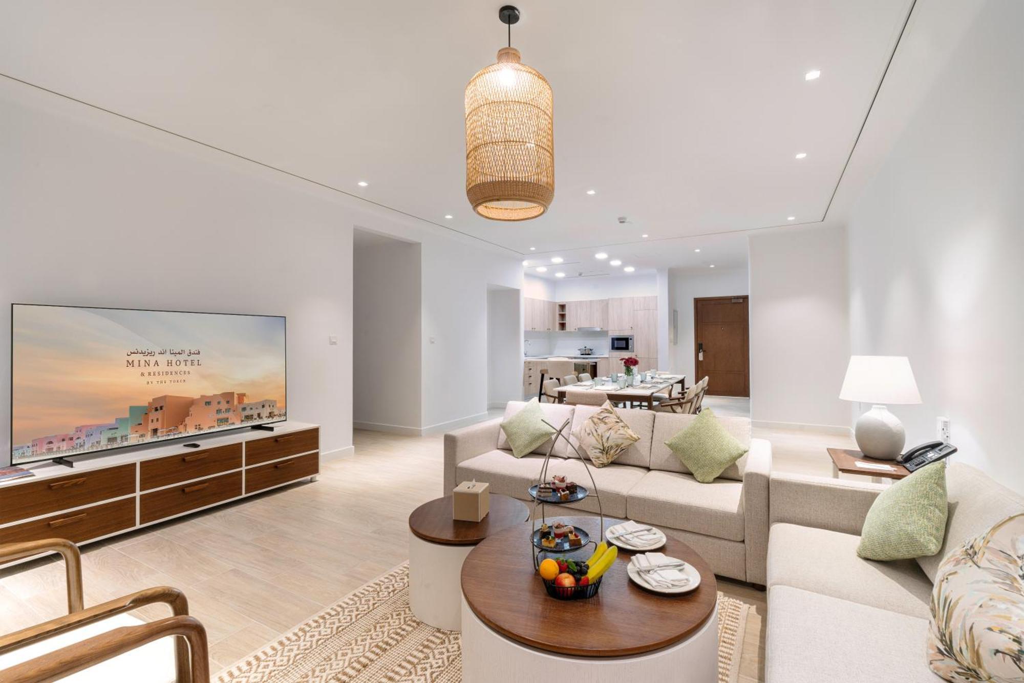 Mina Hotel And Residences By The Torch Doha Exterior foto A living room at the Ritz-Carlton, DIFC
