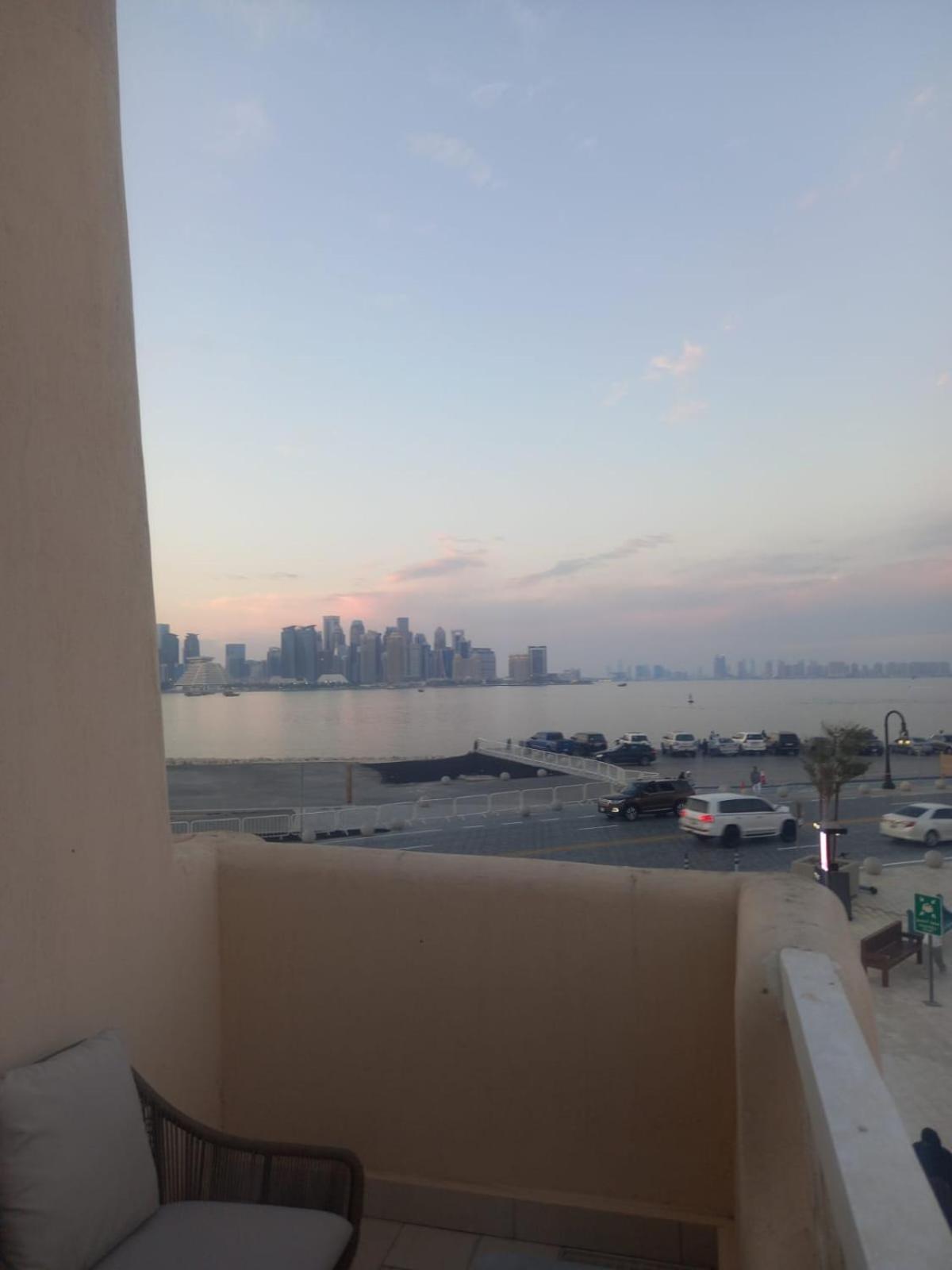 Mina Hotel And Residences By The Torch Doha Exterior foto View of Manama skyline from a residential area in Saar